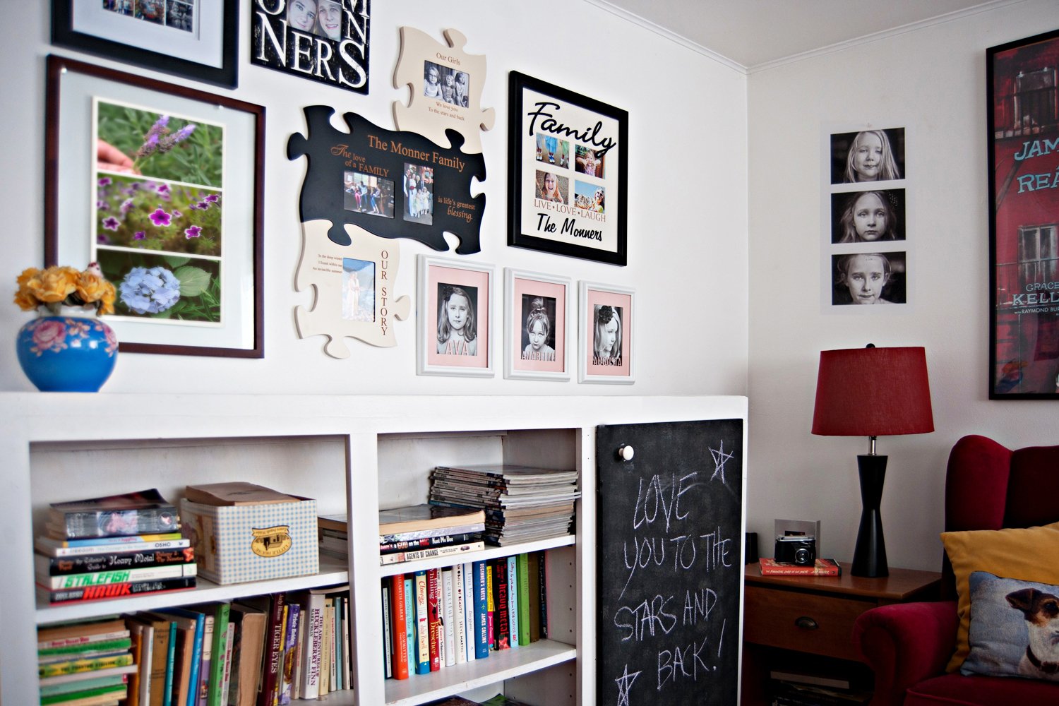 Vintage gallery wall with thick frames and decorative plate