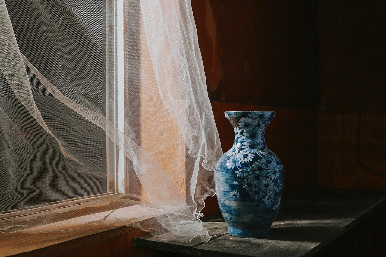 Ceramic vases styled on a shelf