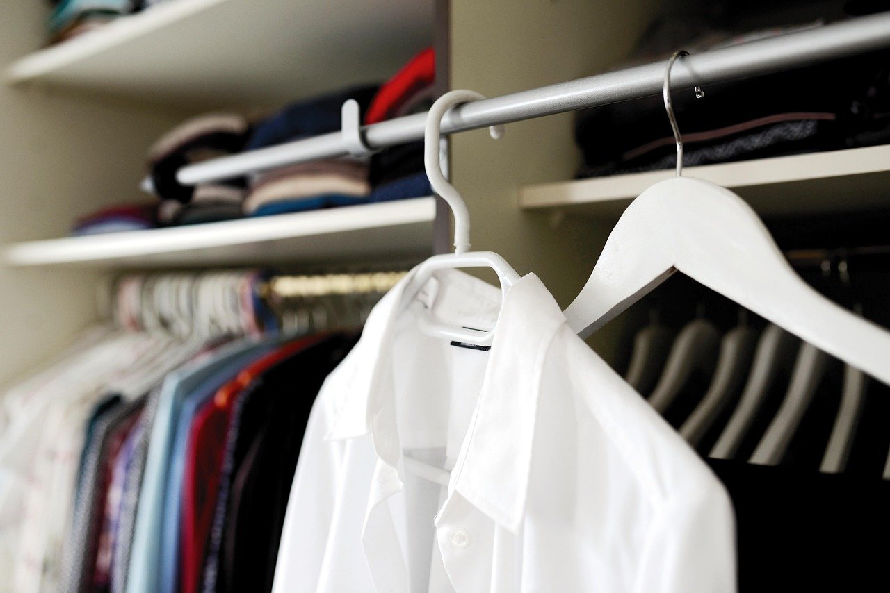 Wardrobe and coat hangers in a dressing room