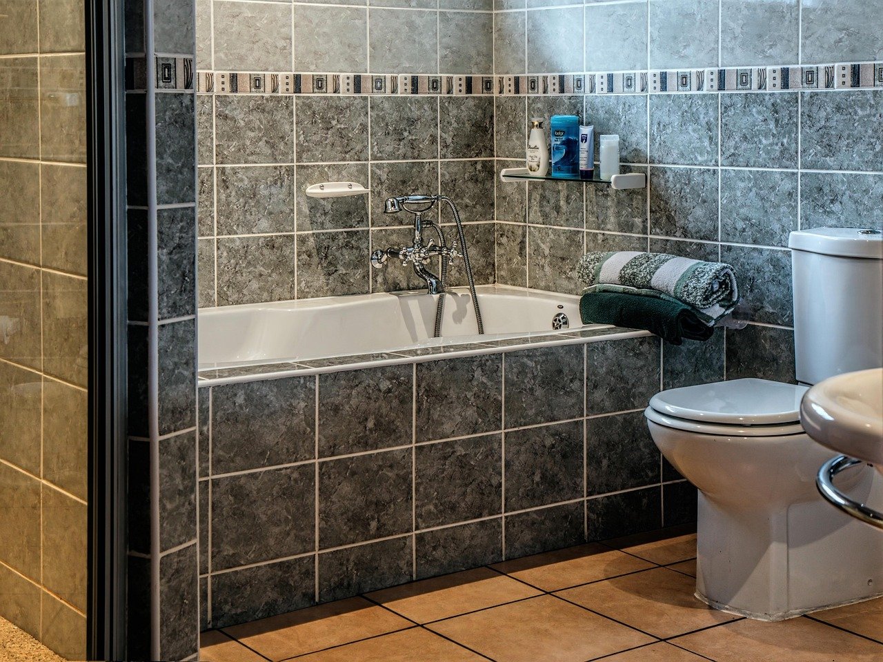 Modern bathroom with bathtub and storage