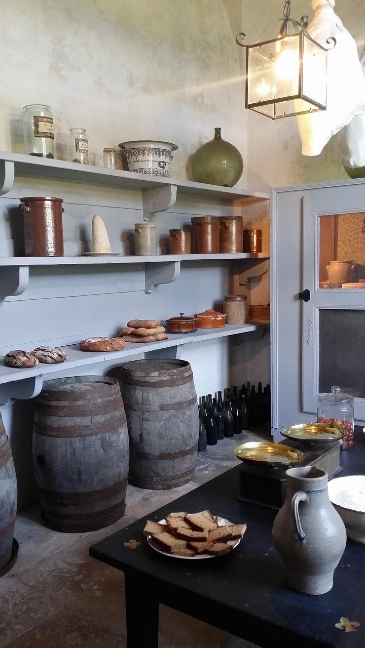 Organized, functional butler's pantry or scullery tucked behind the main kitchen