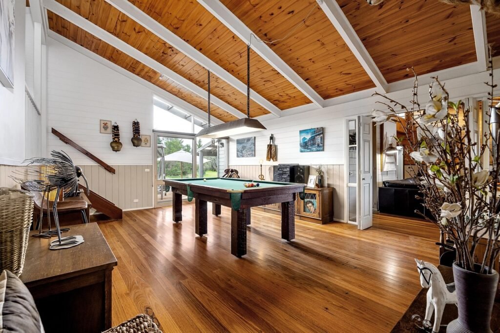 Cozy home game room with table and seating