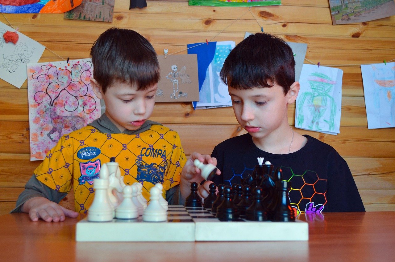 Friends playing a board game together