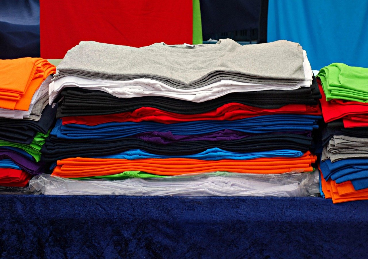 Clothes folded and sorted by color