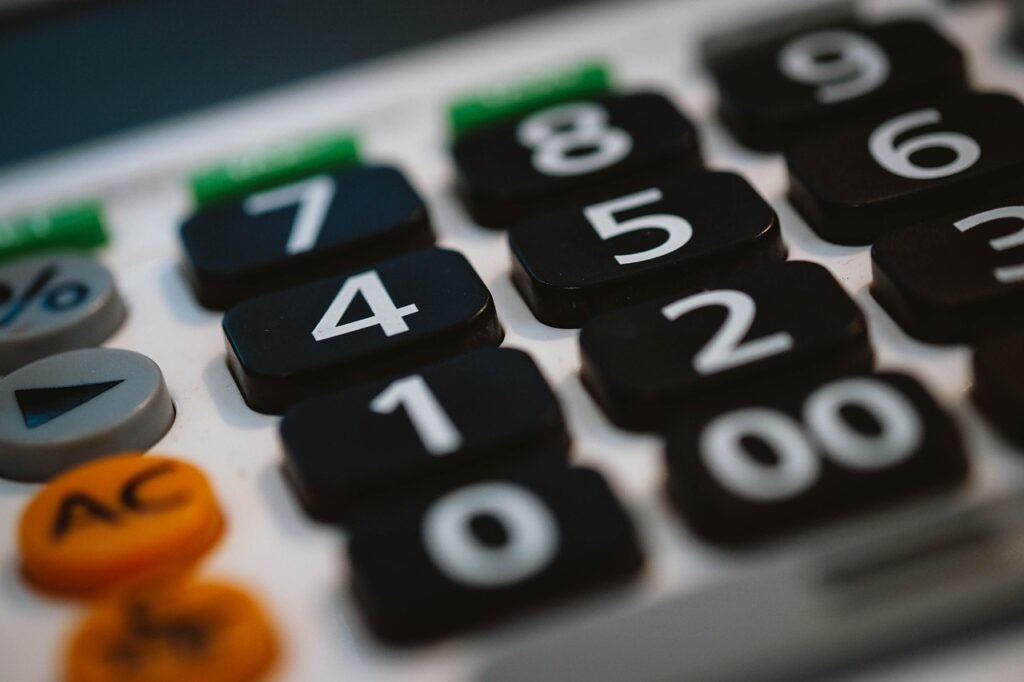 Household budget planning with calculator and bills