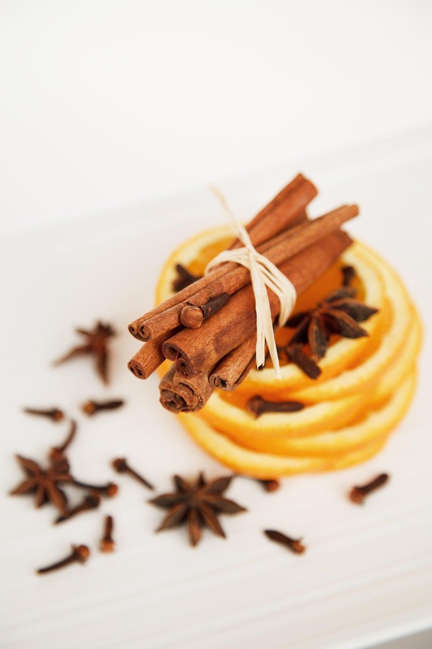 Cinnamon sticks and orange slices for a Christmas garland
