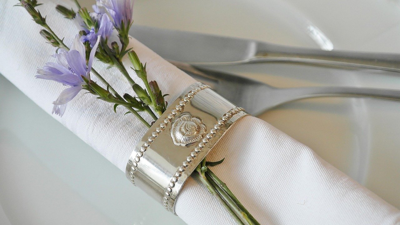 Napkin ring and place setting on a dining table