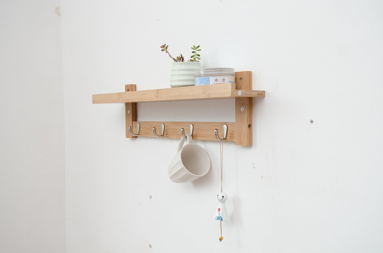 Wall-mounted coat rack with hooks